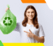 Woman holding a green recycled plastic bag with a recycling symbol, promoting eco-friendly and sustainable waste management.